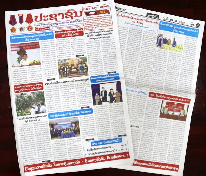 Lao newspaper August Revolution and lessons in integration period